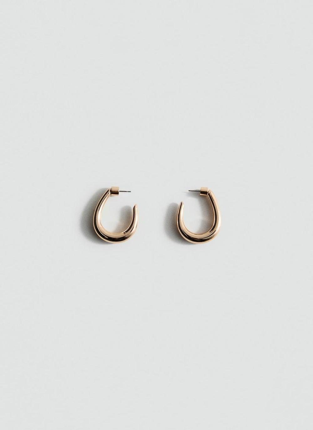 MANGO Chic Twisted Hoop Earrings for Stylish Accents - Image 1