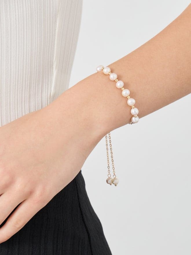 Styli Elegance - Women's Multi Faux Pearl Bracelet with Bolo Clasp - Image 1