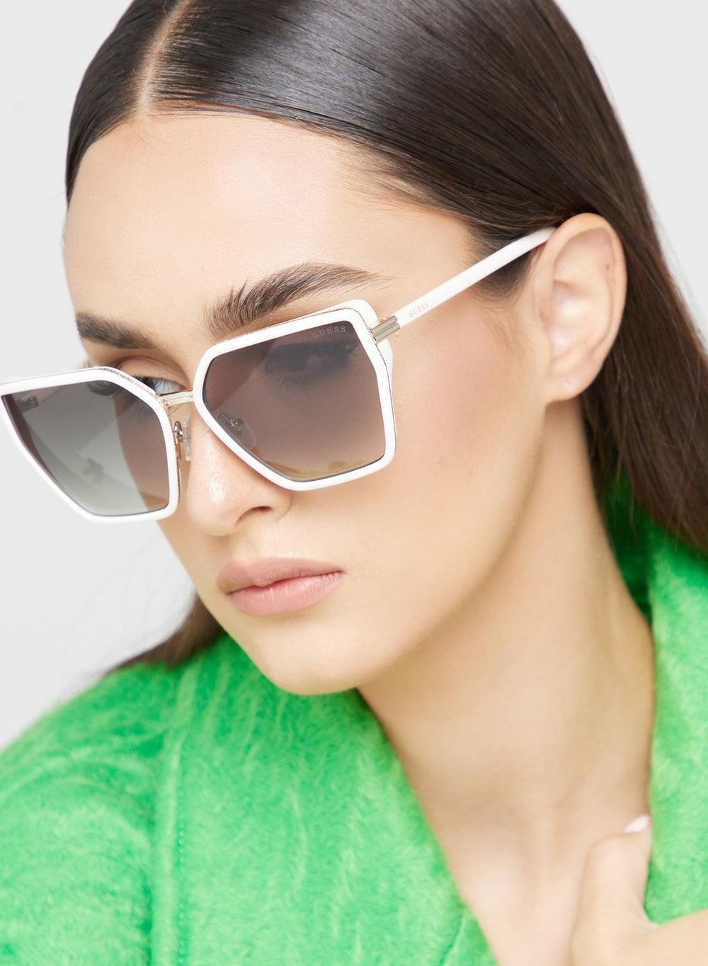 GUESS Pentagon Chic Sunglasses for Stylish Women - Image 1