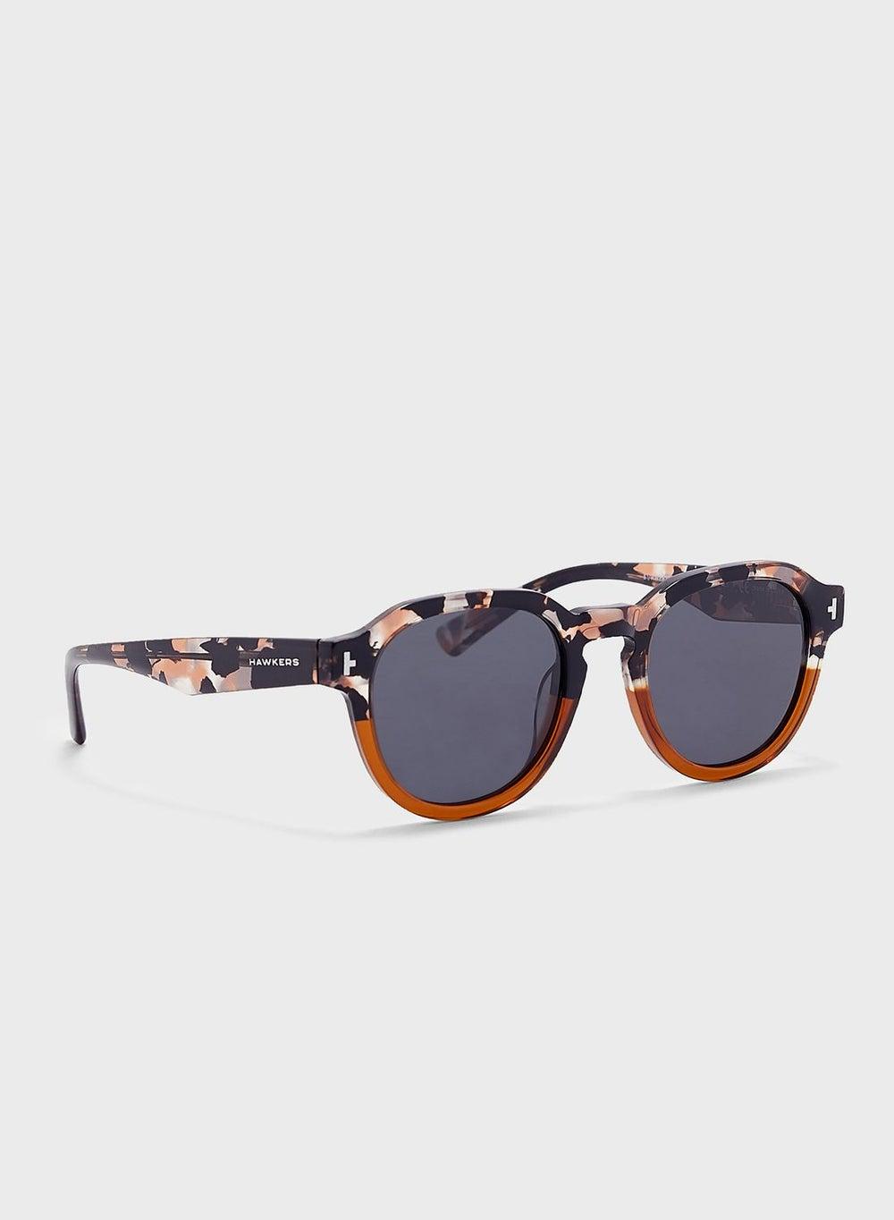 HAWKERS Warwick Round Sunglasses for Women - Chic Elegance - Image 1