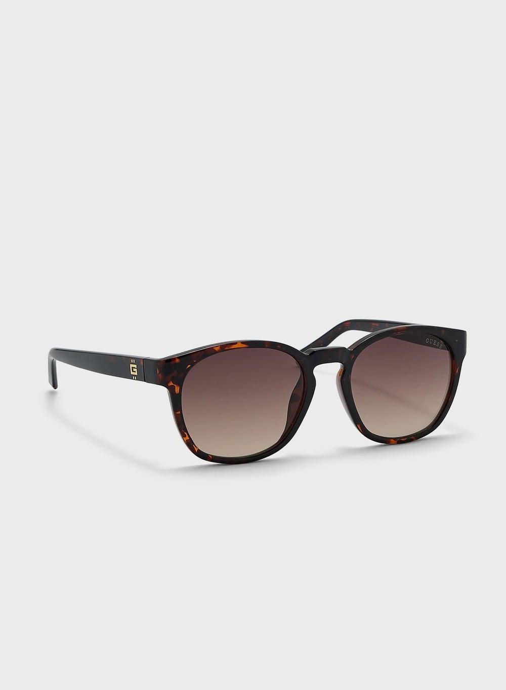 GUESS Elegant Round Women's Sunglasses with UV Protection - Image 1