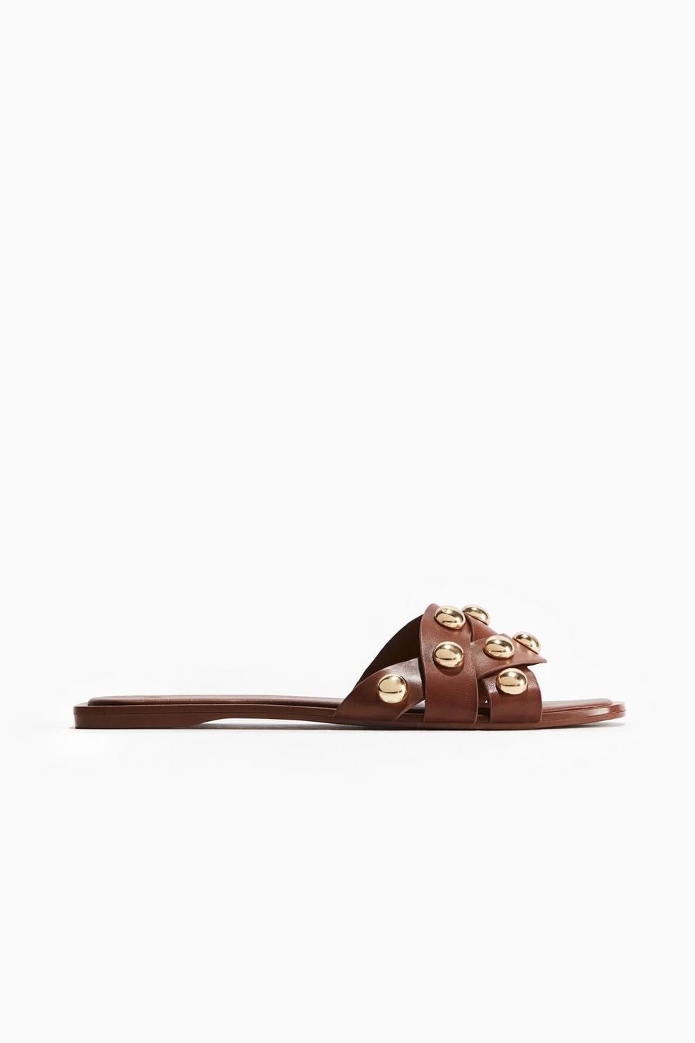 Elegant Braided Sandals with Shimmering Metal Accents - Image 1