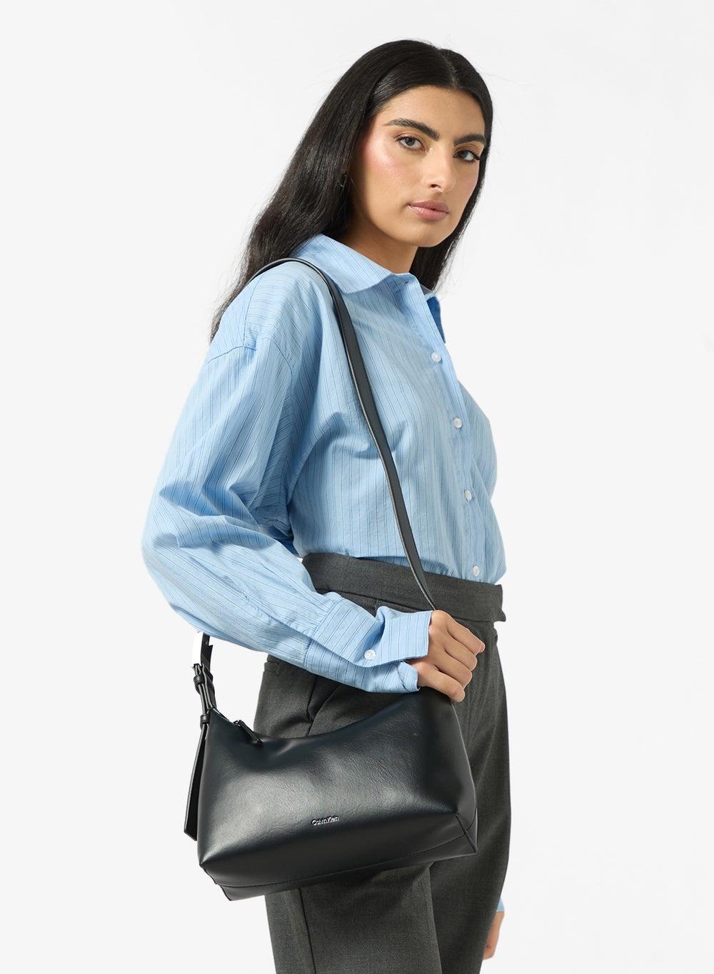 CALVIN KLEIN Chic Medium Crossbody with Sleek Hardware Strap - Image 1