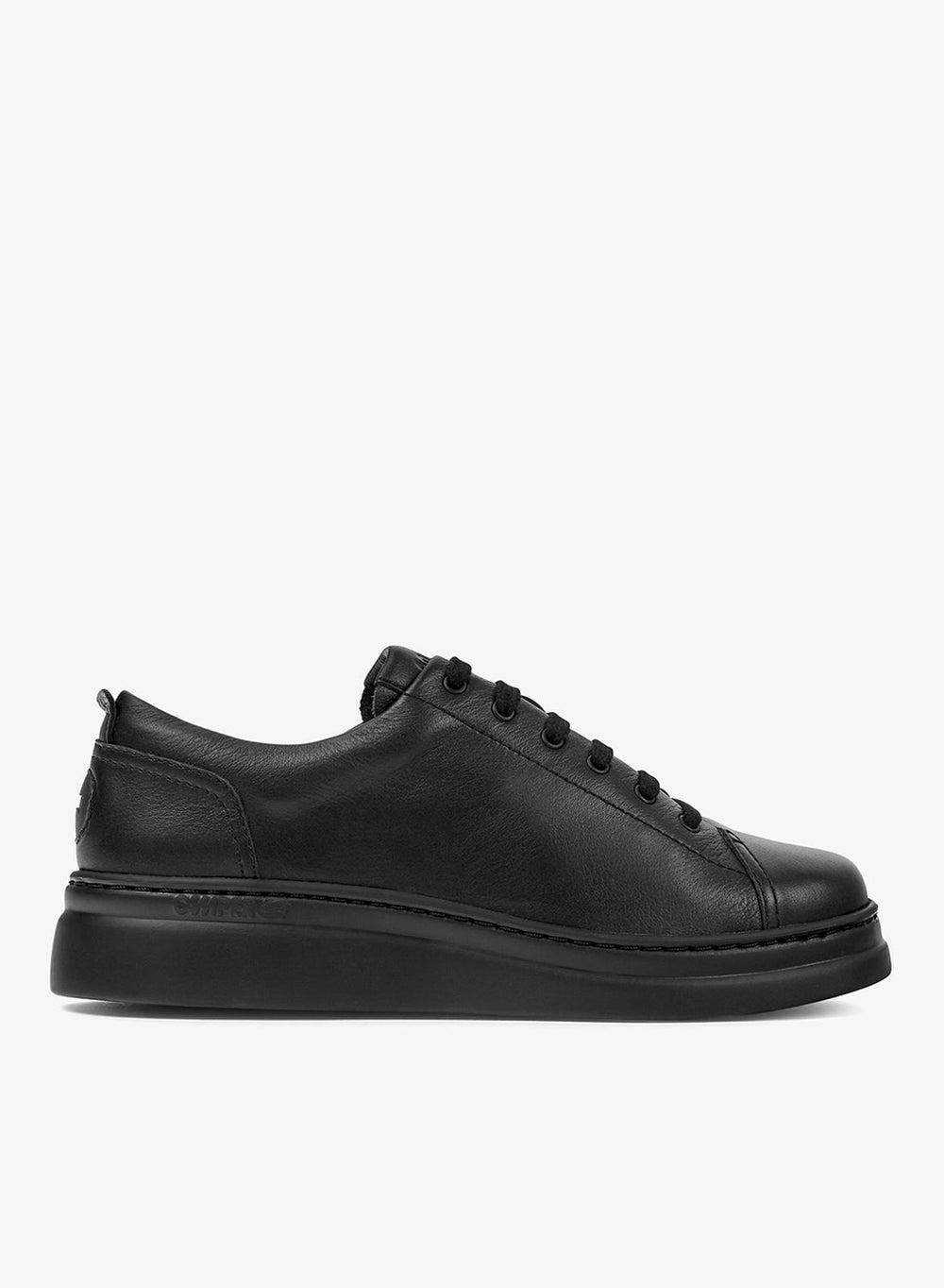 Elegance in Motion: Runner Up Women's Black Low-Top Sneaker - Image 1