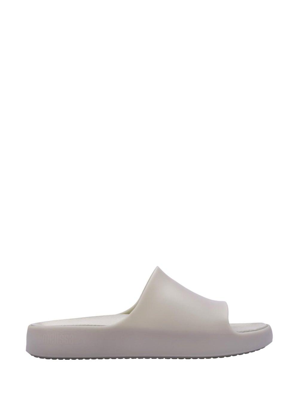 Melissa Cloud Slide Ad: Elegance in Off White - Image 1