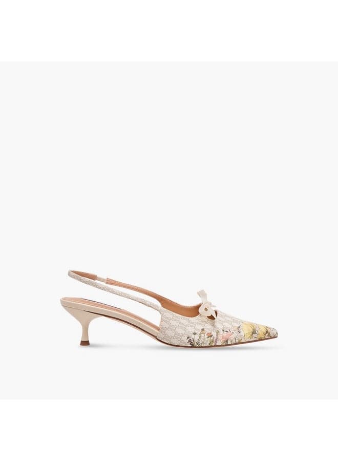 J10157 009 Monogram Elegance: Ivory Kitten Heel Slingbacks - Image 1