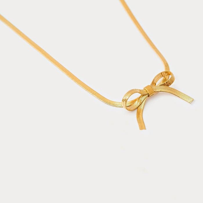 Noya 18K Gold-Plated Holly Bow Choker – Timeless Elegance - Image 1