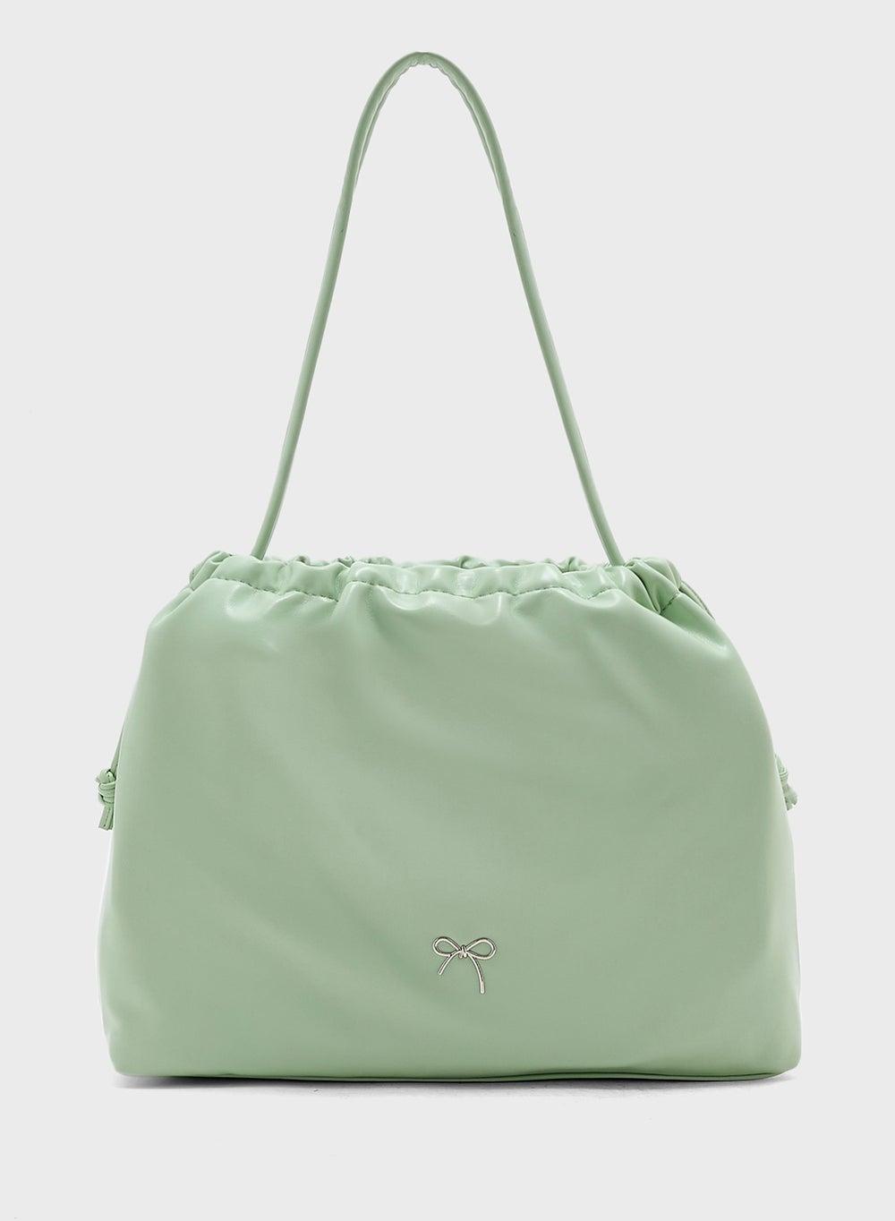 Ginger Chic Drawstring Shoulder Bag with Bow Trim - Image 1