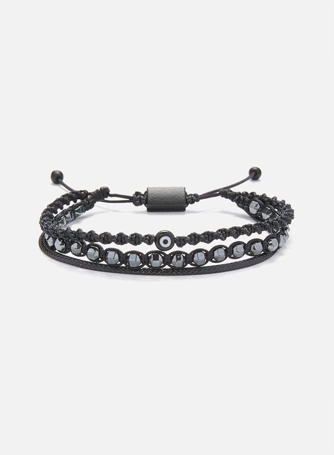 CHRYSOSTOMOS Artisan Multi-Line Hematite & Black Glass Evil Eye Bracelet - Image 1