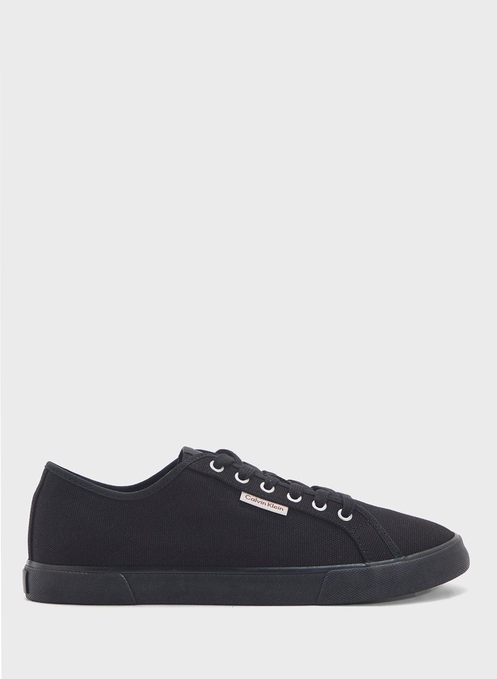 Monaco Triple Black Ym0Ym013010Gj: Sleek Low-Top Sneakers - Image 1