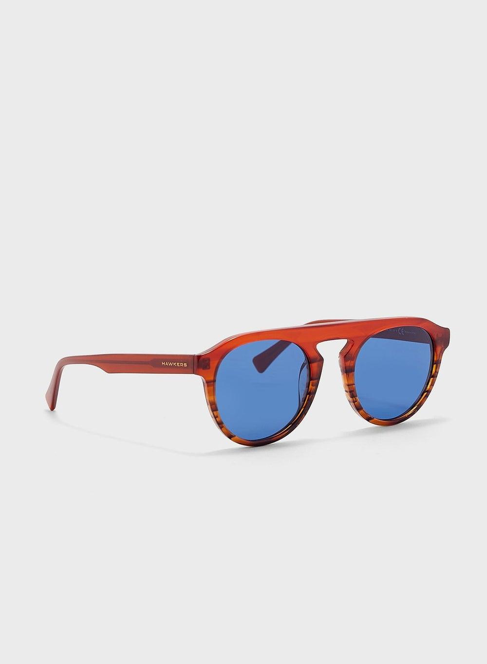 HAWKERS Blast Elegant Round Sunglasses for Women - Image 1