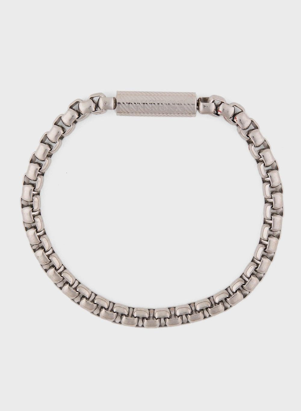 GUESS Elegant Men's Logo Bracelet with Polished Charm - Image 1