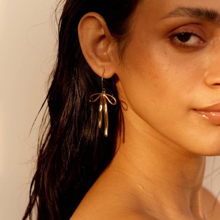 Noya Scarlett Bow Drop Earrings - 18K Gold Elegance - Image 1