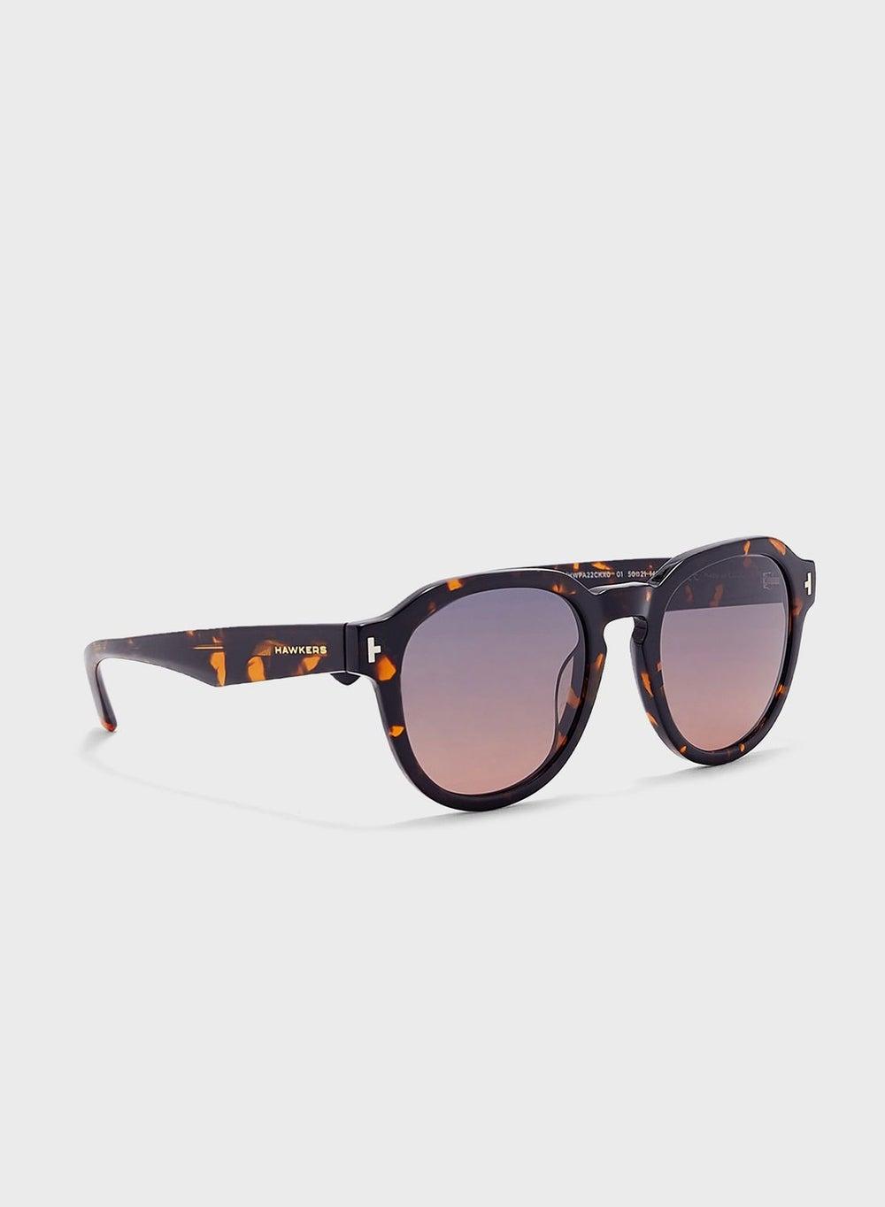 HAWKERS Warwick Round Sunglasses for Women - Timeless Style - Image 1