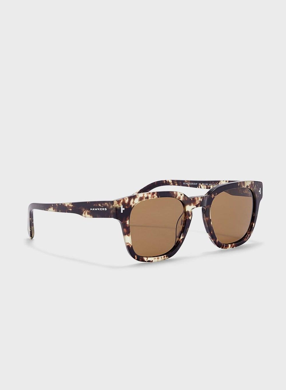 HAWKERS Stack Pentagon Chic Sunglasses for Women - Image 1