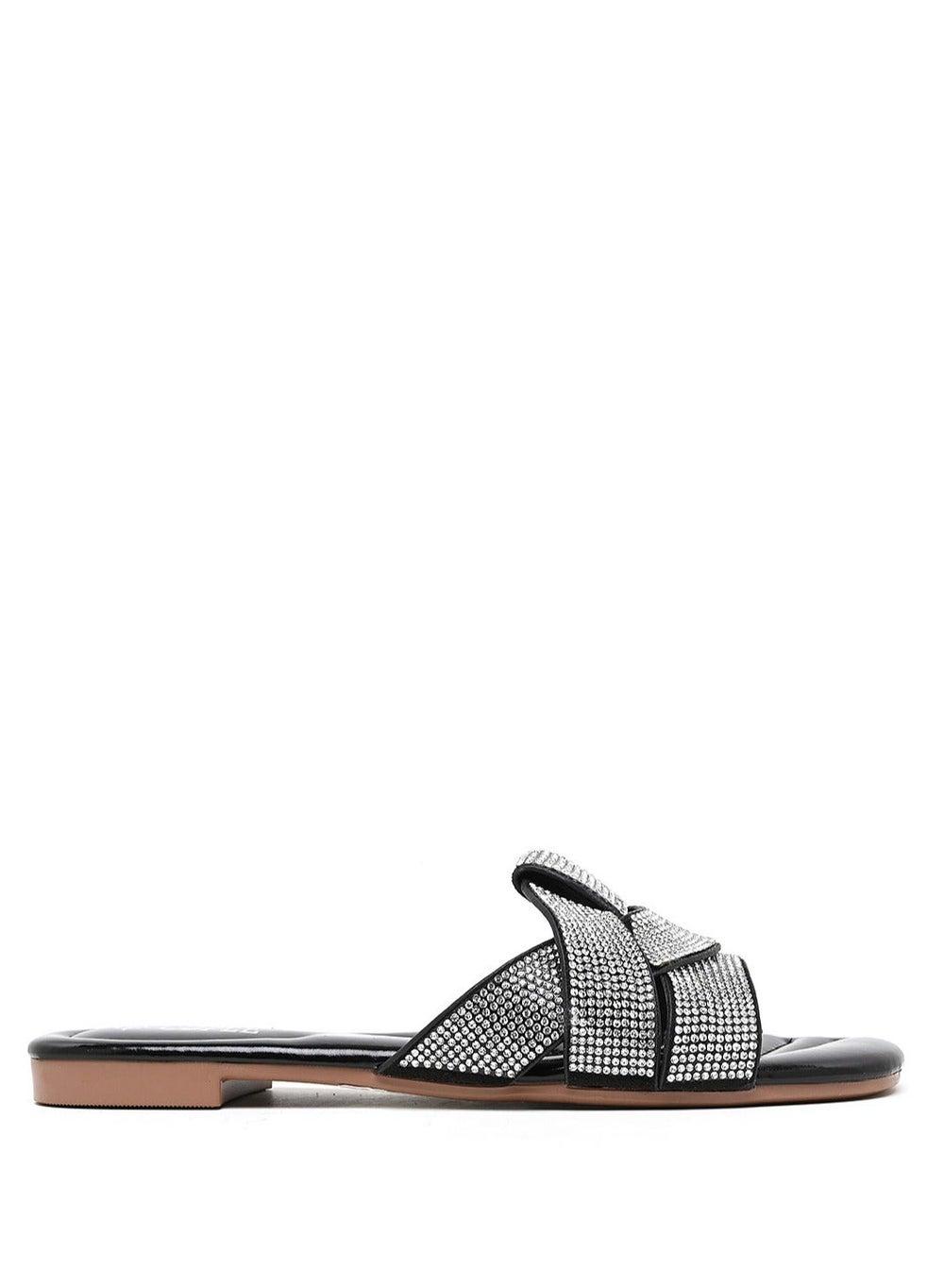 Elegant Black Flat Sandals with Cross Strap Detail - Image 1