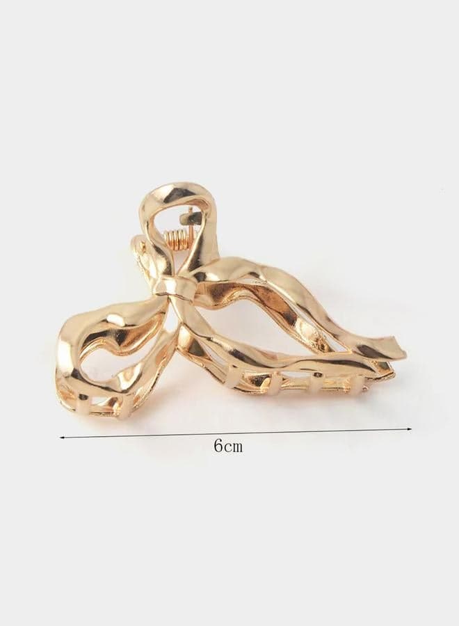Elegant Gold Metal Bow Hair Clamp for Stylish Hold - Image 1