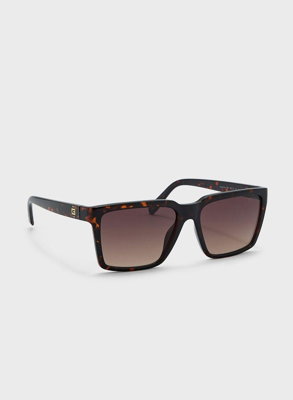 GUESS Tortoiseshell Elegance: Chic Sunglasses for Women - Image 1