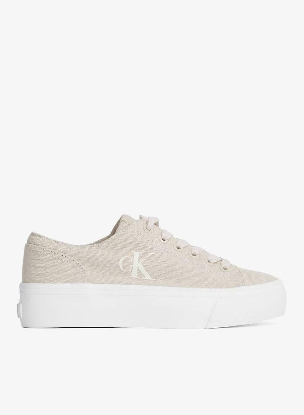 Eco-Conscious Flatform Low Sneakers in Creamy White - Image 1