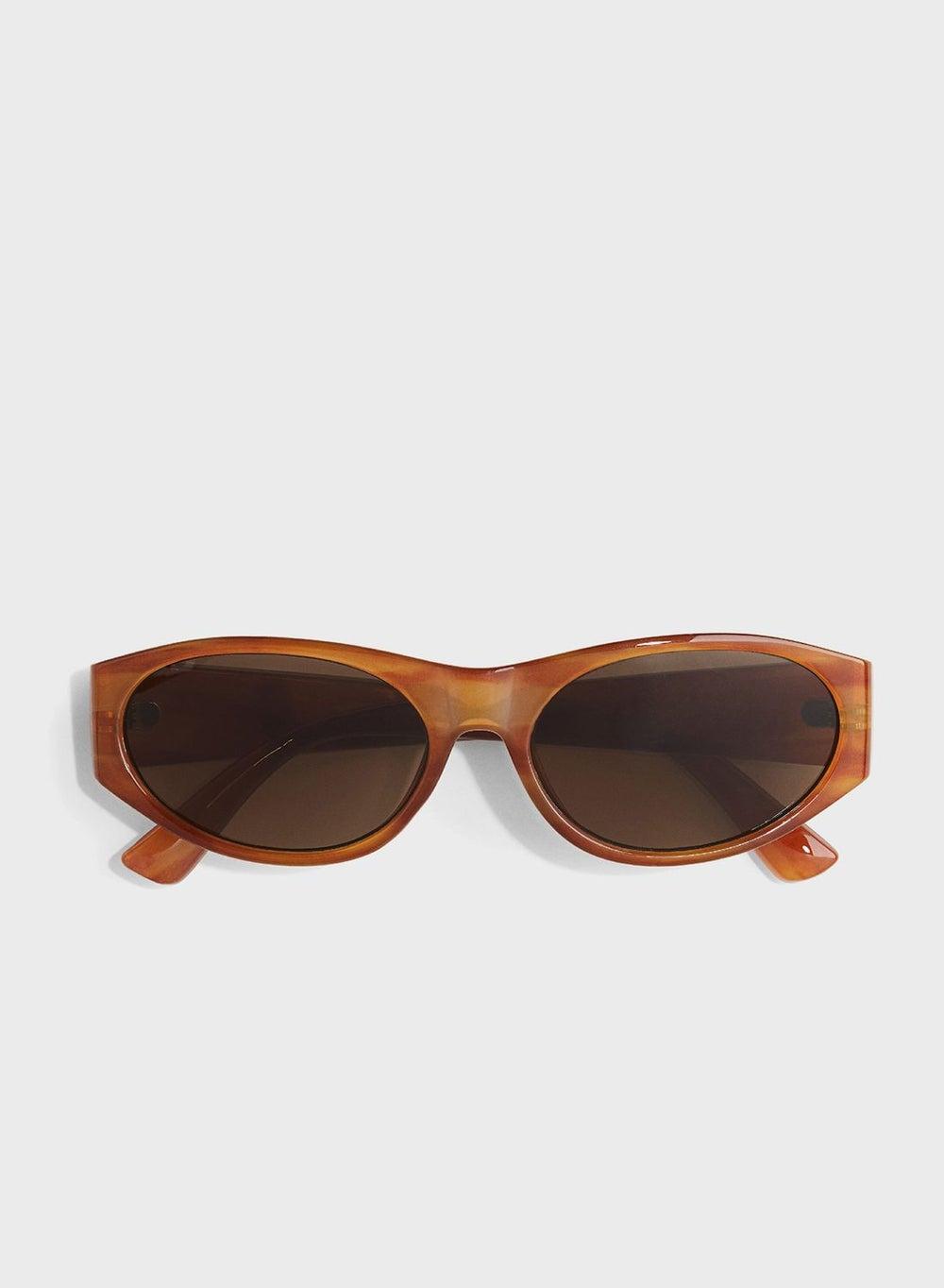 H&M Oval Sunglasses for Men: Sleek Summer Style - Image 1