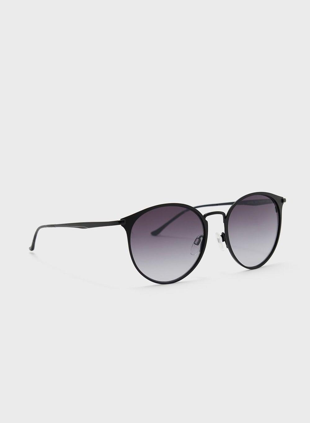 Donna Karan Elegant Round Sunglasses for Women - Image 1