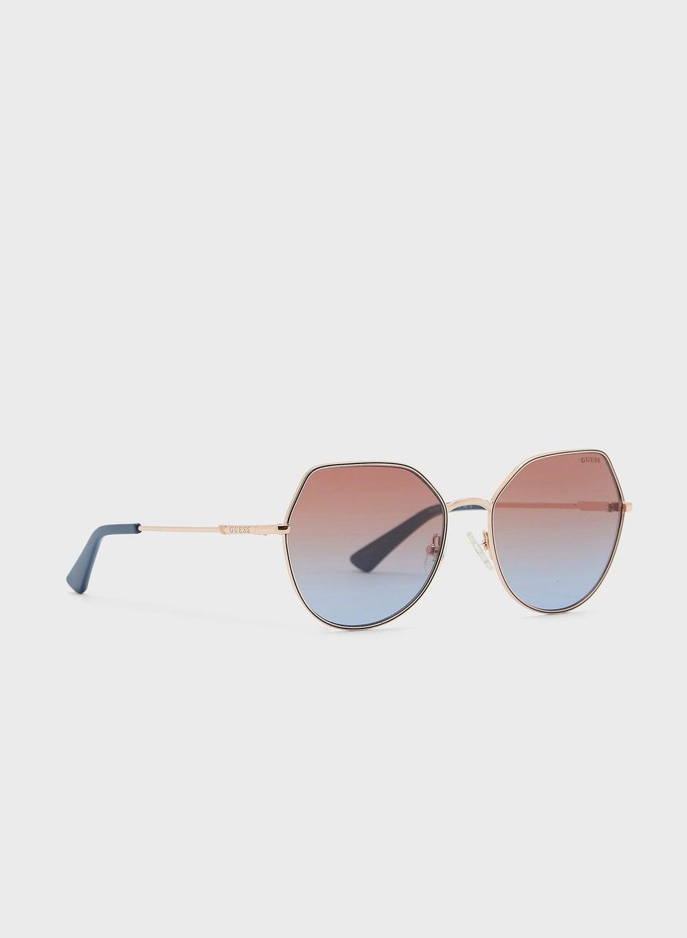 GUESS Pentagon Chic Sunglasses for Sophisticated Women - Image 1