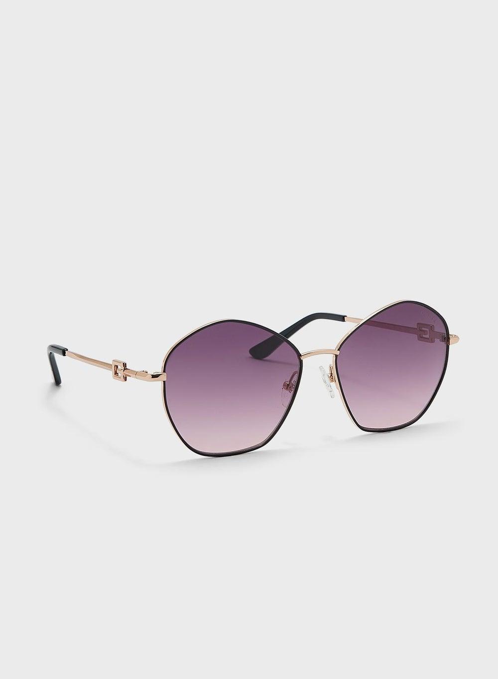 GUESS Feminine Round Metal Sunglasses - Image 1