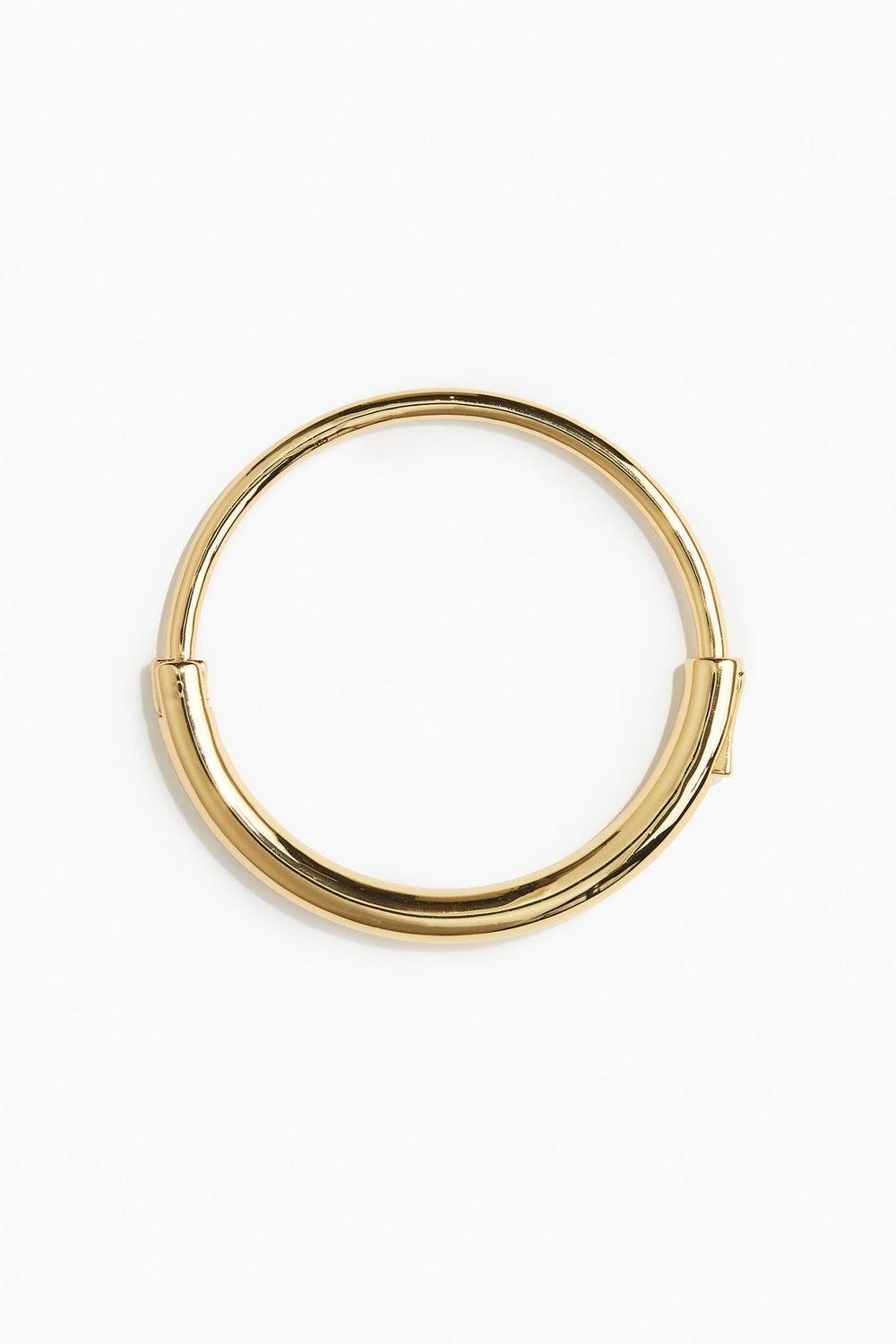 H&M Heavenly Gold-Plated Bangle: Chic Accessory - Image 1