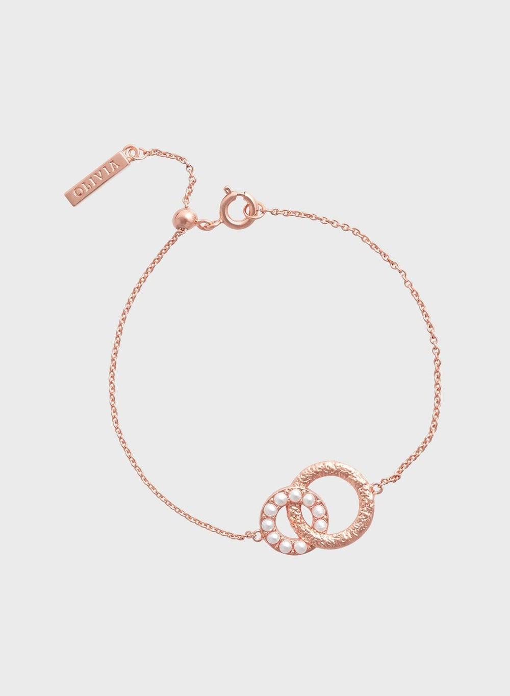 OLIVIA BURTON Pearls Hand Chain Bracelet - Elegance Unleashed - Image 1