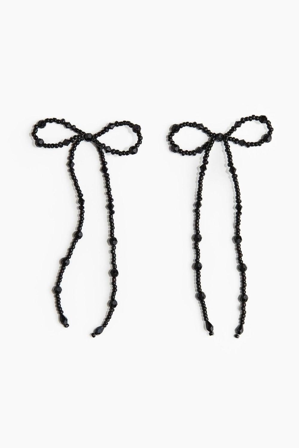 H&M Chic Bow-Shaped Glass Bead Earrings for Women - Image 1
