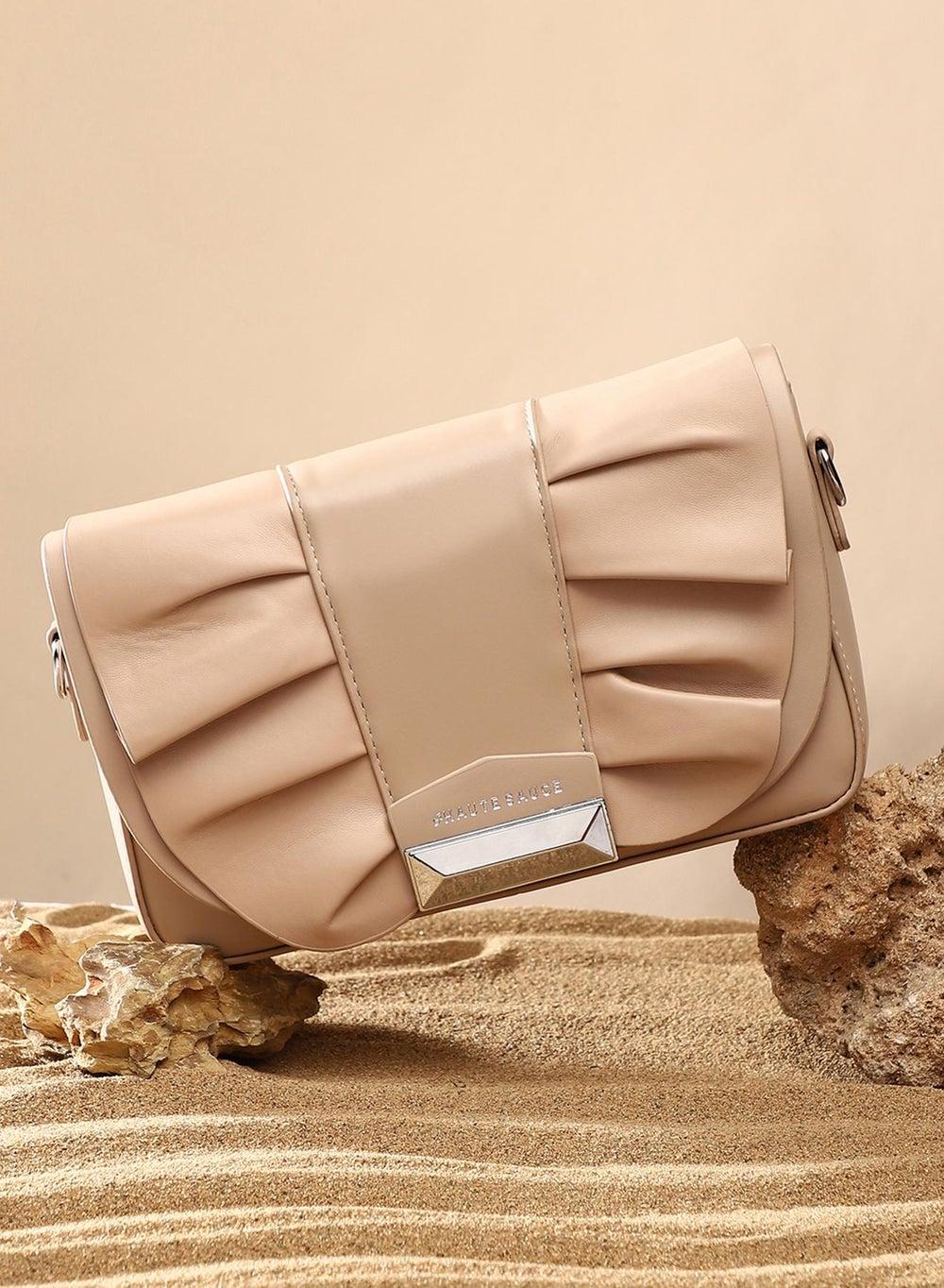 Haute Sauce Beige Ruched Sling Bag for the Fashion-Forward Woman - Image 1