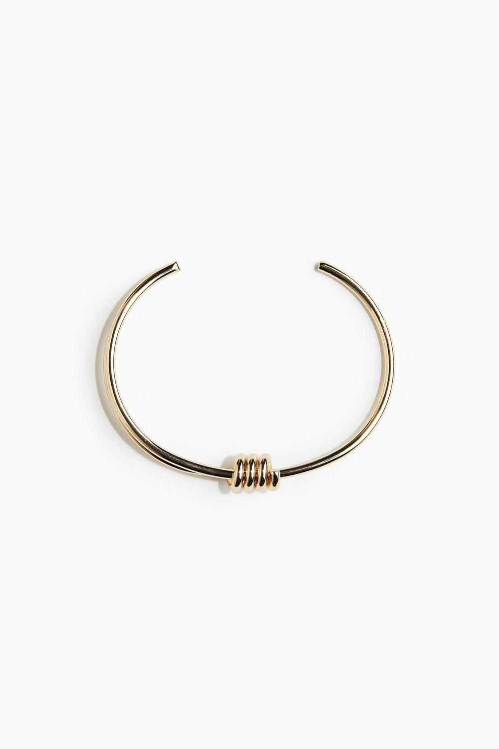 H&M Elegant Steel Cuff Bracelet with Spiral Detail - Image 1