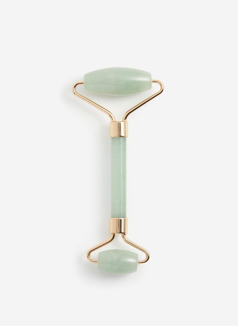 Elegant Jade Face Roller for Radiant Skin - Image 1