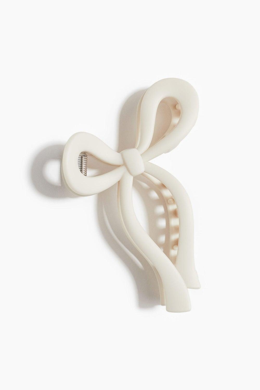 H&M Elegant Bow Hair Claw: Style Meets Function - Image 1