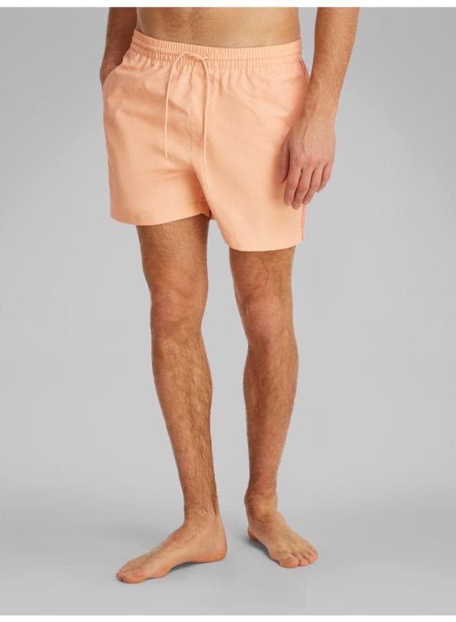 Calvin Klein Logo Tape Medium Swim Shorts KM0KM01109 - Image 1