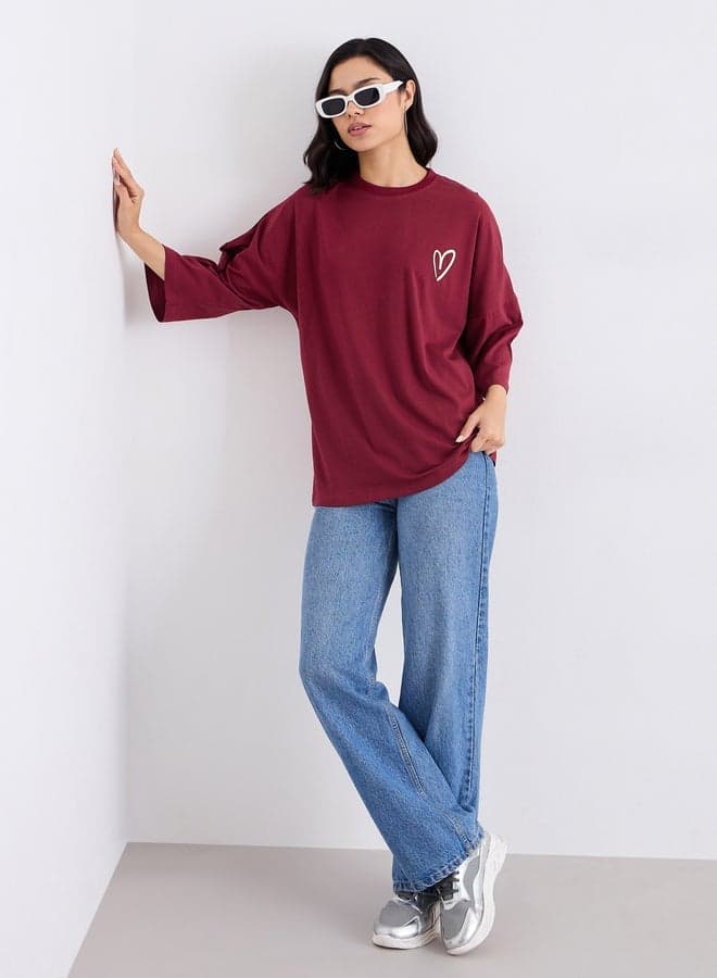 Styli Oversized Longline Slogan Cotton T-Shirt Red - Image 1