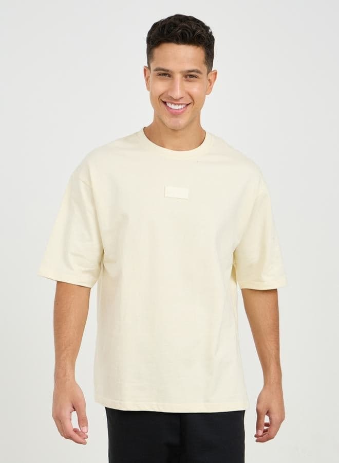 Styli Oversized Terry T-Shirt with Silicon Badge Detail - Image 1