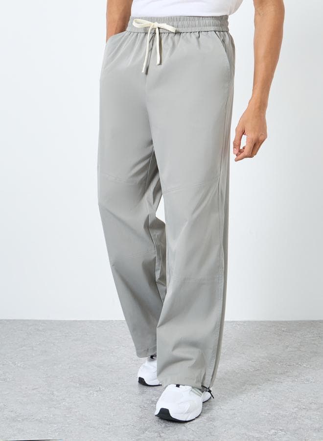 Styli Men’s Light Grey Wide-Leg Parachute Pants - Image 1