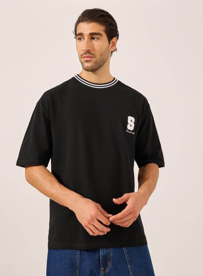 Styli Varsity Embroidered Pique T-Shirt 7010184901 Black - Image 1