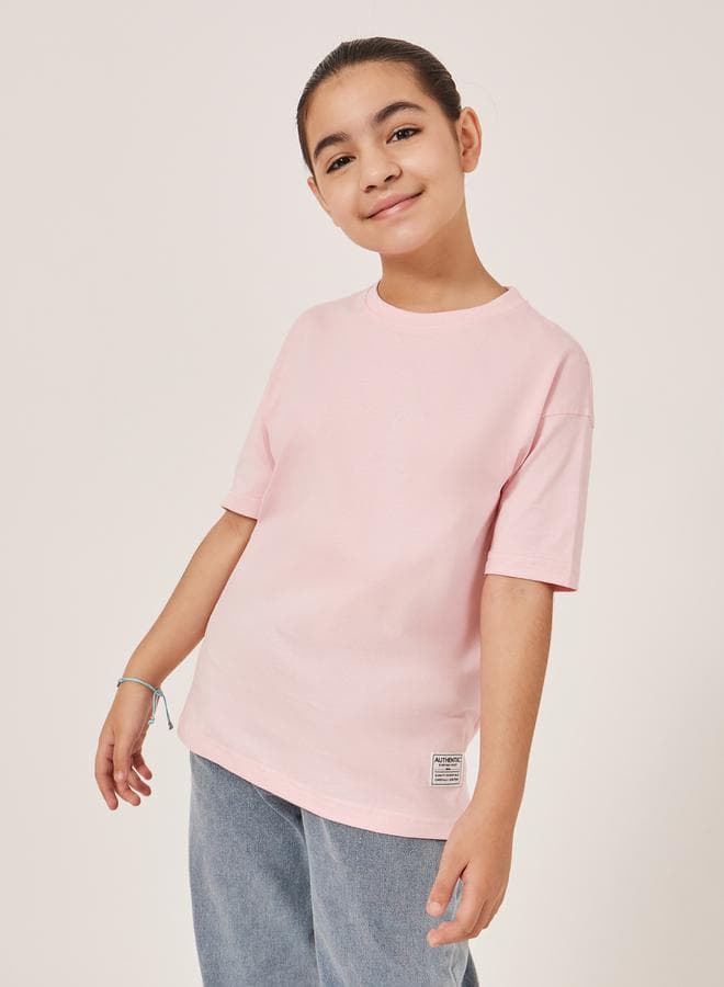 Styli Pink Oversized T-Shirt with Badge Accent - Image 1