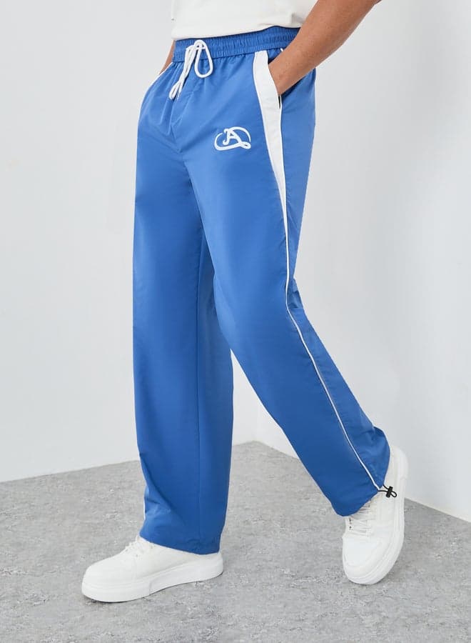 Oversized Blue Joggers with Side Piping Loop Detail - Image 1