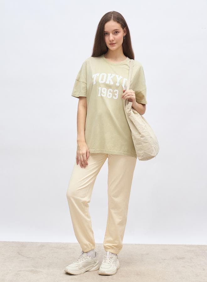 Styli Green Graphic Tee & Cuffed Jogger Set - Image 1