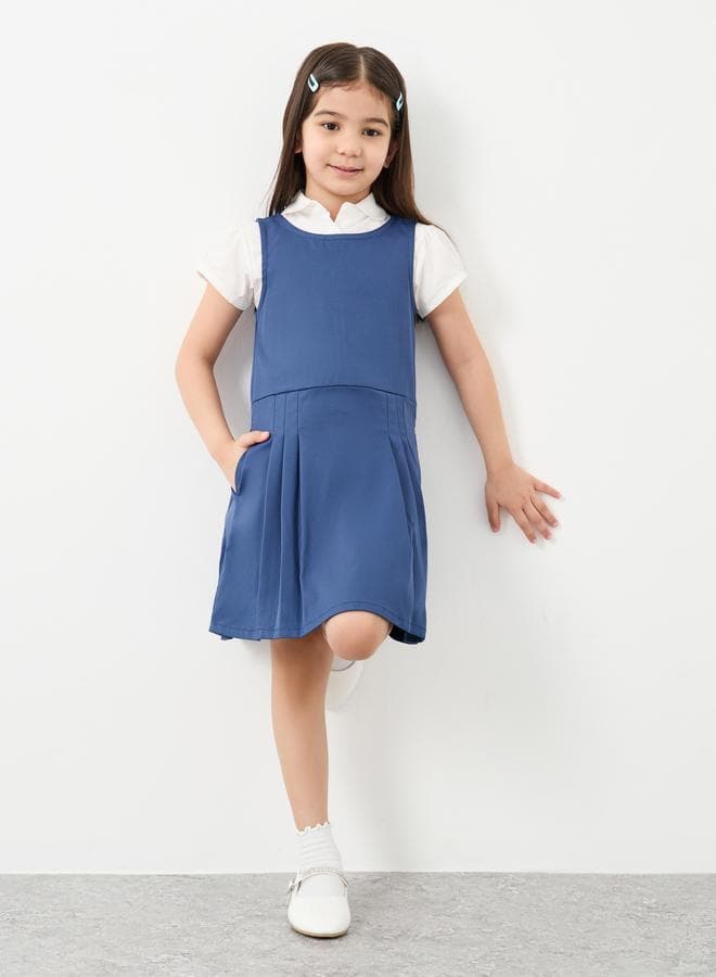 Girls Navy Blue Pinafore Dress with Pocket Detail - Image 1