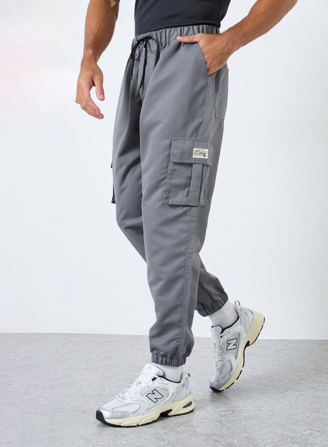 Grey Relaxed Fit Cargo Pants with Drawstring Waist - Image 1