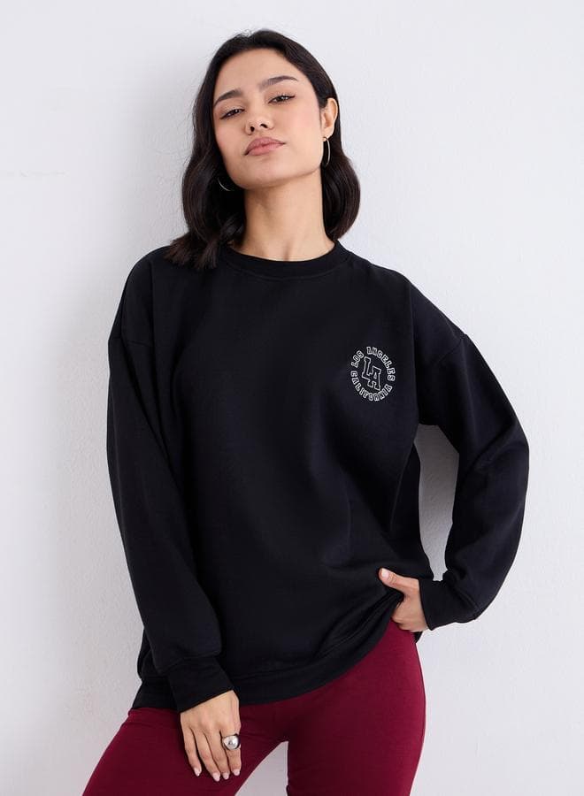 Styli Black Oversized Longline Graphic Sweatshirt - Image 1