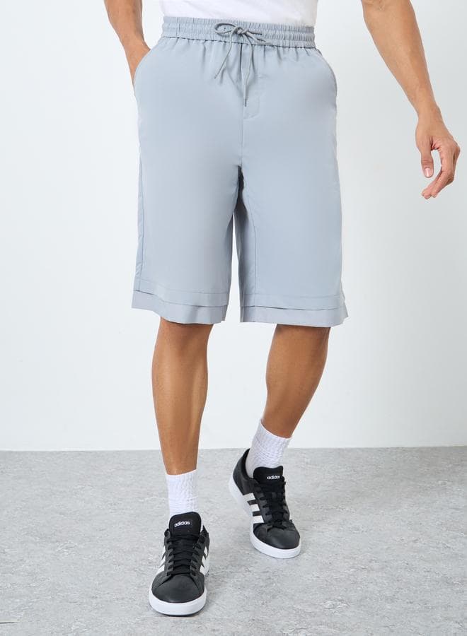 Styli Men Grey Oversized Drawstring Casual Shorts - Image 1