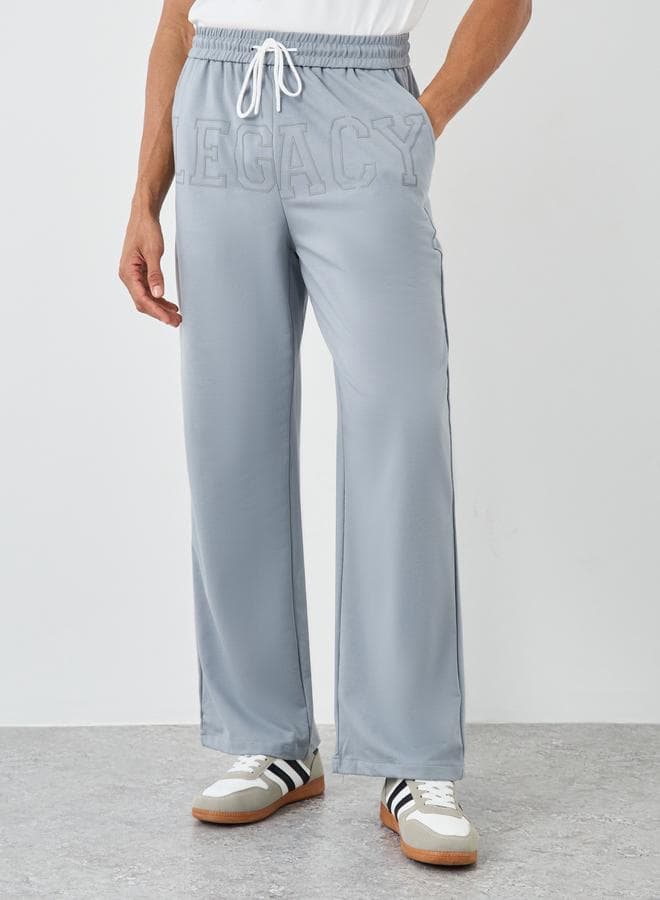 Styli Men Grey Legacy Slogan Joggers Contrast Drawstring - Image 1
