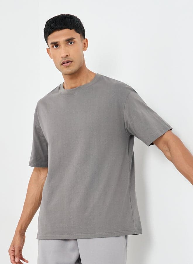 Styli Men’s Grey Oversized Graphic Crew Neck T-Shirt - Image 1