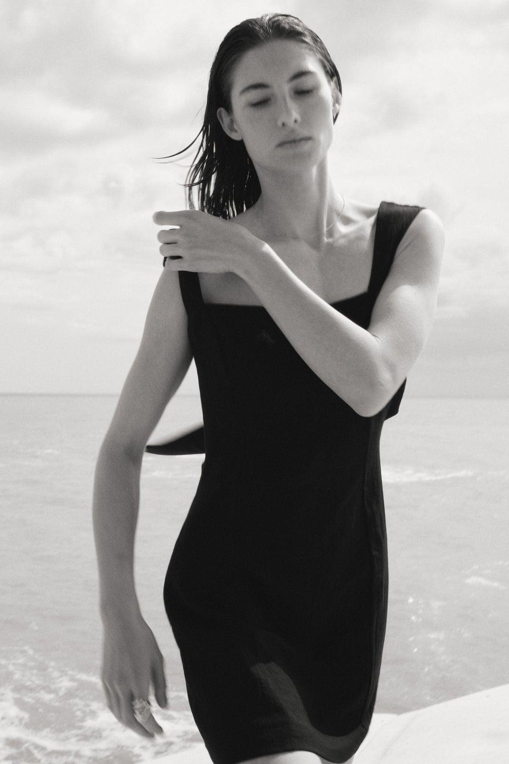 Black Bow-Back Midi Dress with Open Waist Detail - Image 1
