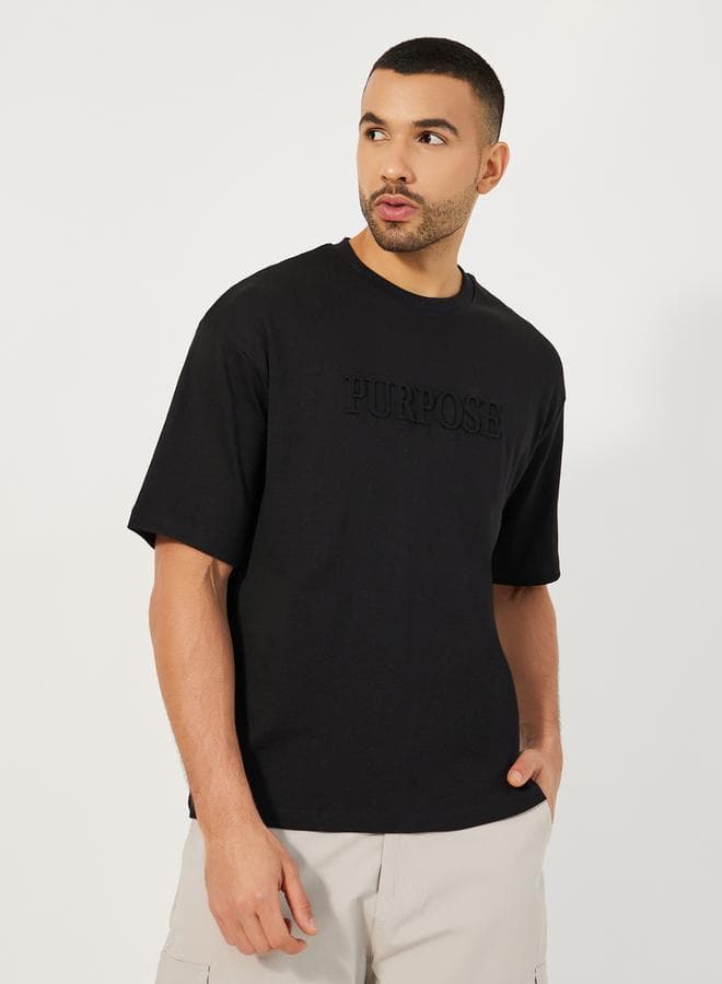 Oversized Embossed Graphic Crew Neck T-Shirt 7009615001 - Image 1